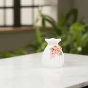 White Porcelain Vase with Orange Flowers - Porcelain flower vase | decorative vases | small vases for flowers | Porcelain near me | flower vase online | vase for living room | decorative vases for living room | Porcelain home decor items